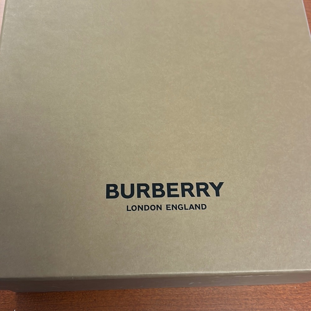 Never worn, brand new Burberry black size36. US size:5.5 still in box.